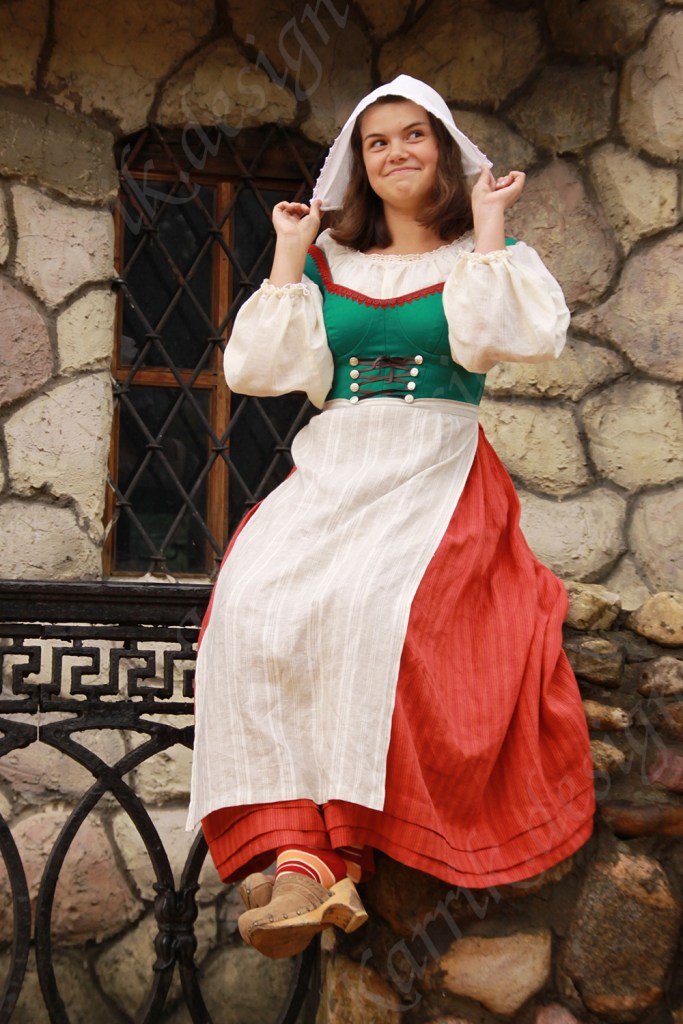 Folk style costume green corset and red skirt